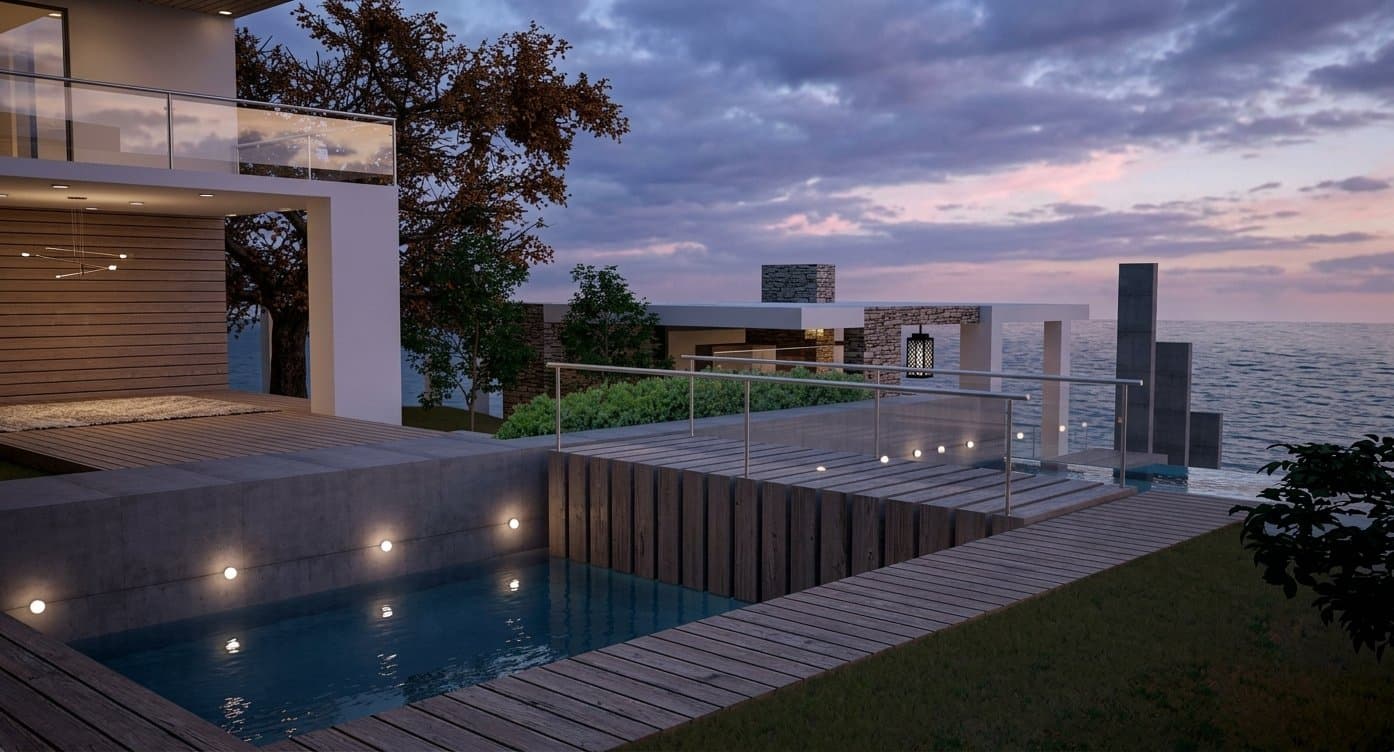 Piscina con vista al mar al atardecer